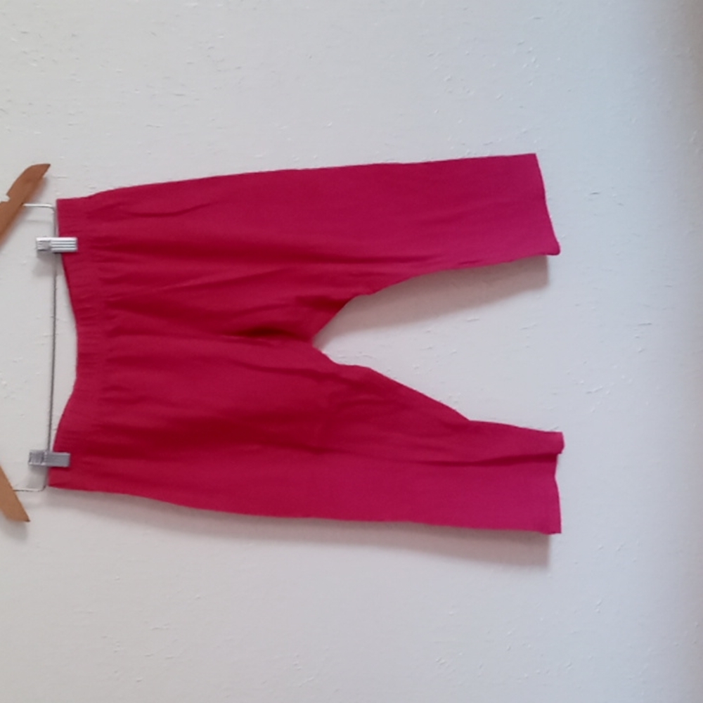 Neon pink past the knee leggings